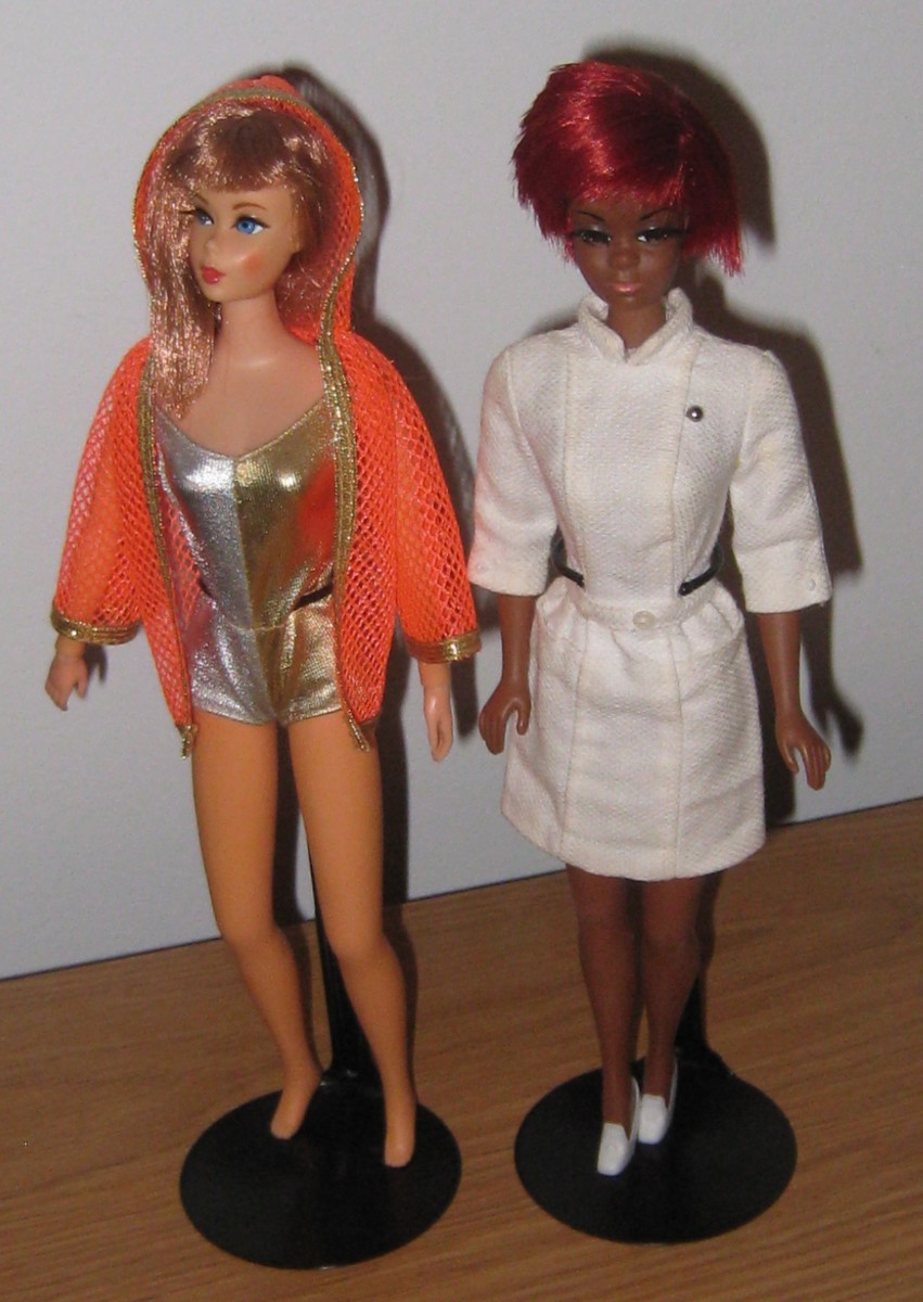 Living Barbie and Julia, whose aging black hair has oxidized to its beautiful crimson color.  