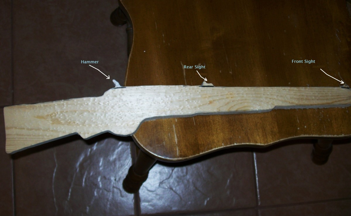 The wood cutout of the 1866 Winchester "Yellow Boy"