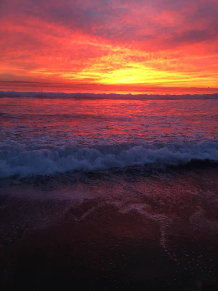 A beautiful, vibrant sunset at Sunset Beach, CA