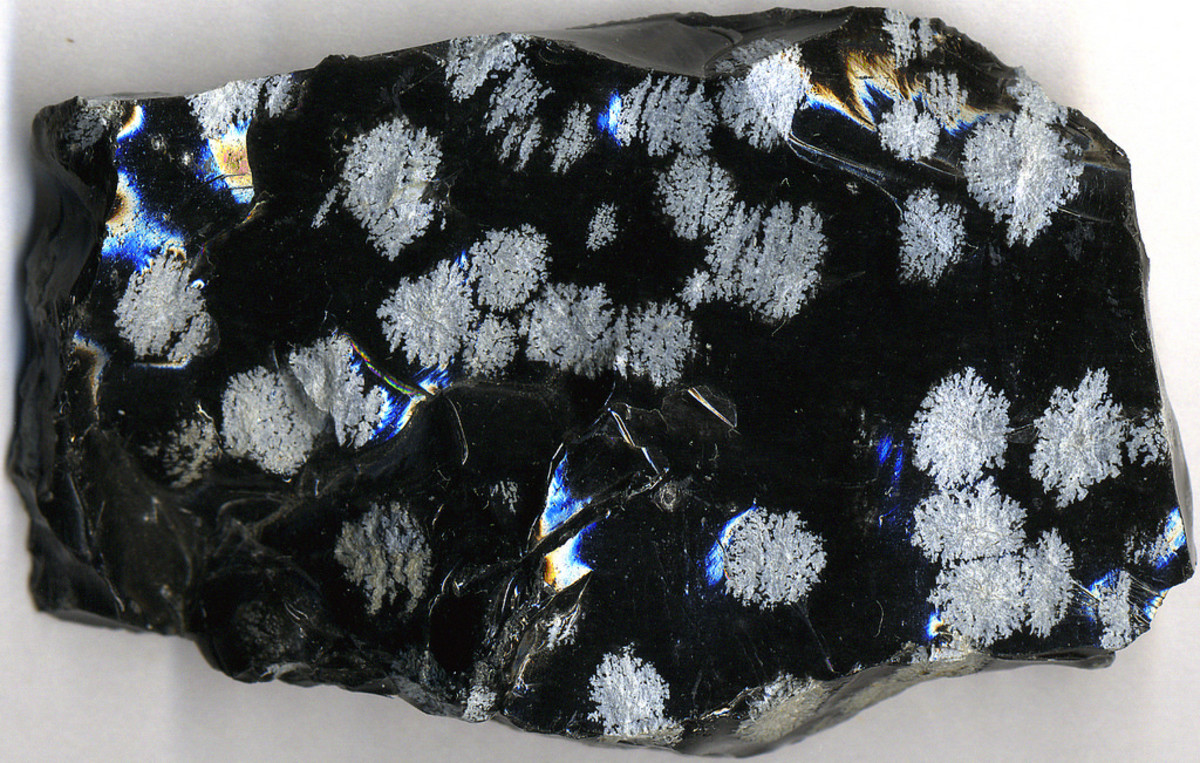 Snowflake obsidian is a white and black variety of natural glass.