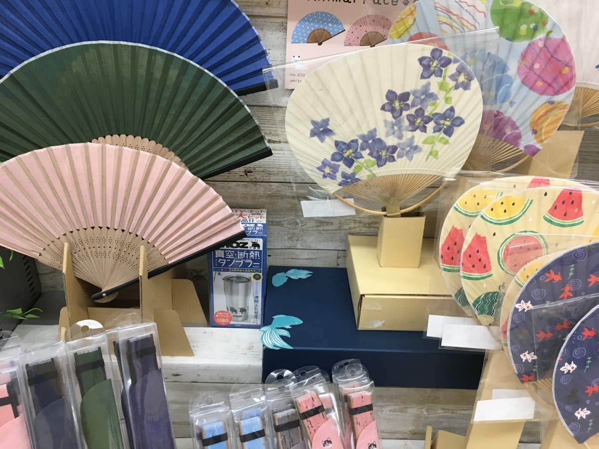 Folding fans and uchiwas (pictured on the right) are great items to have in the summer.