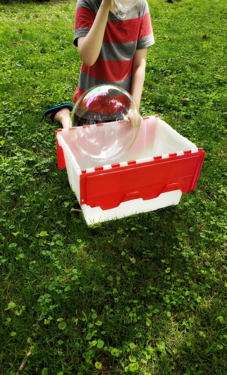 Making big bubbles from your own homemade solution is fun.