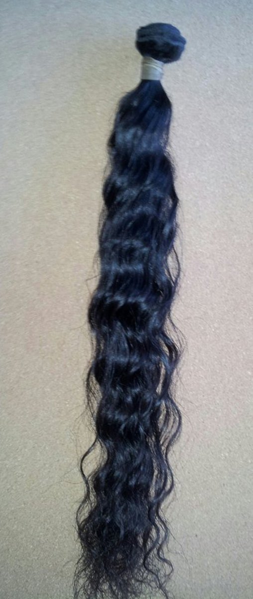 Malaysian hair is fine. If you are using bundles in longer than 18, I'd recommend at least 2 if you like a full look.