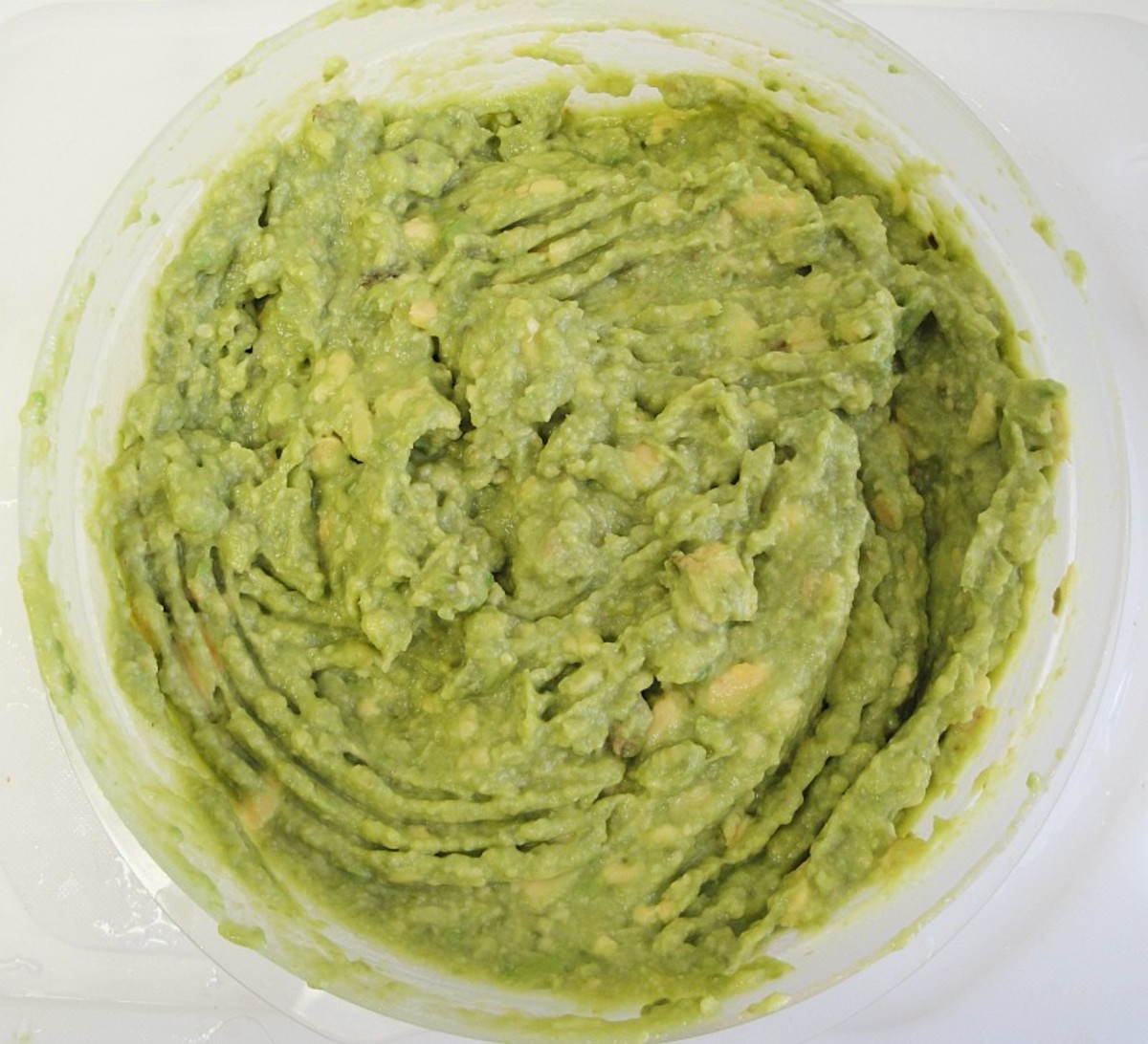 Though it might look like tasty guacamole, pureed avocado can actually work wonders for your skin.