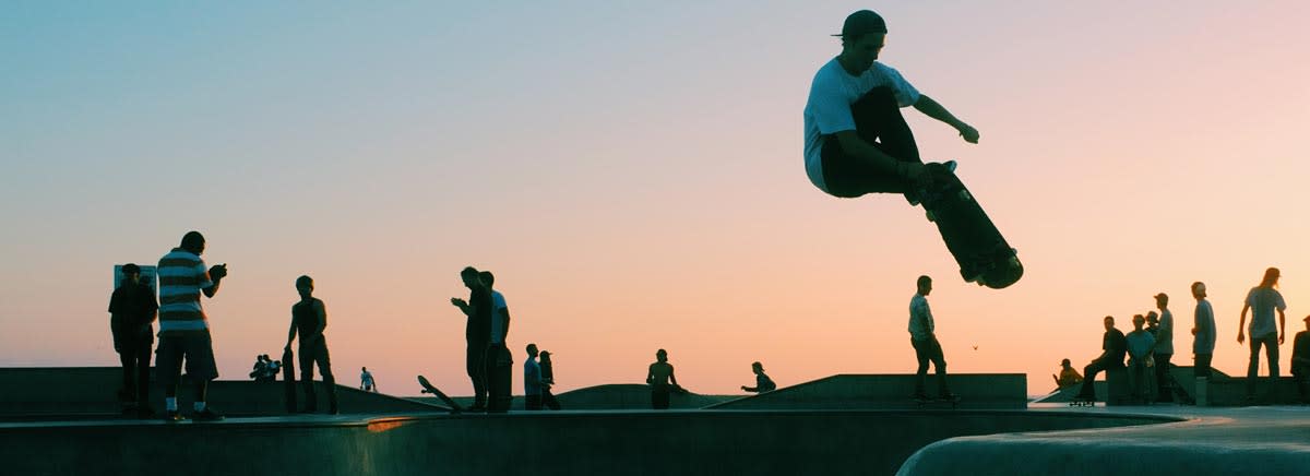 Sunset skating in workwear brands.