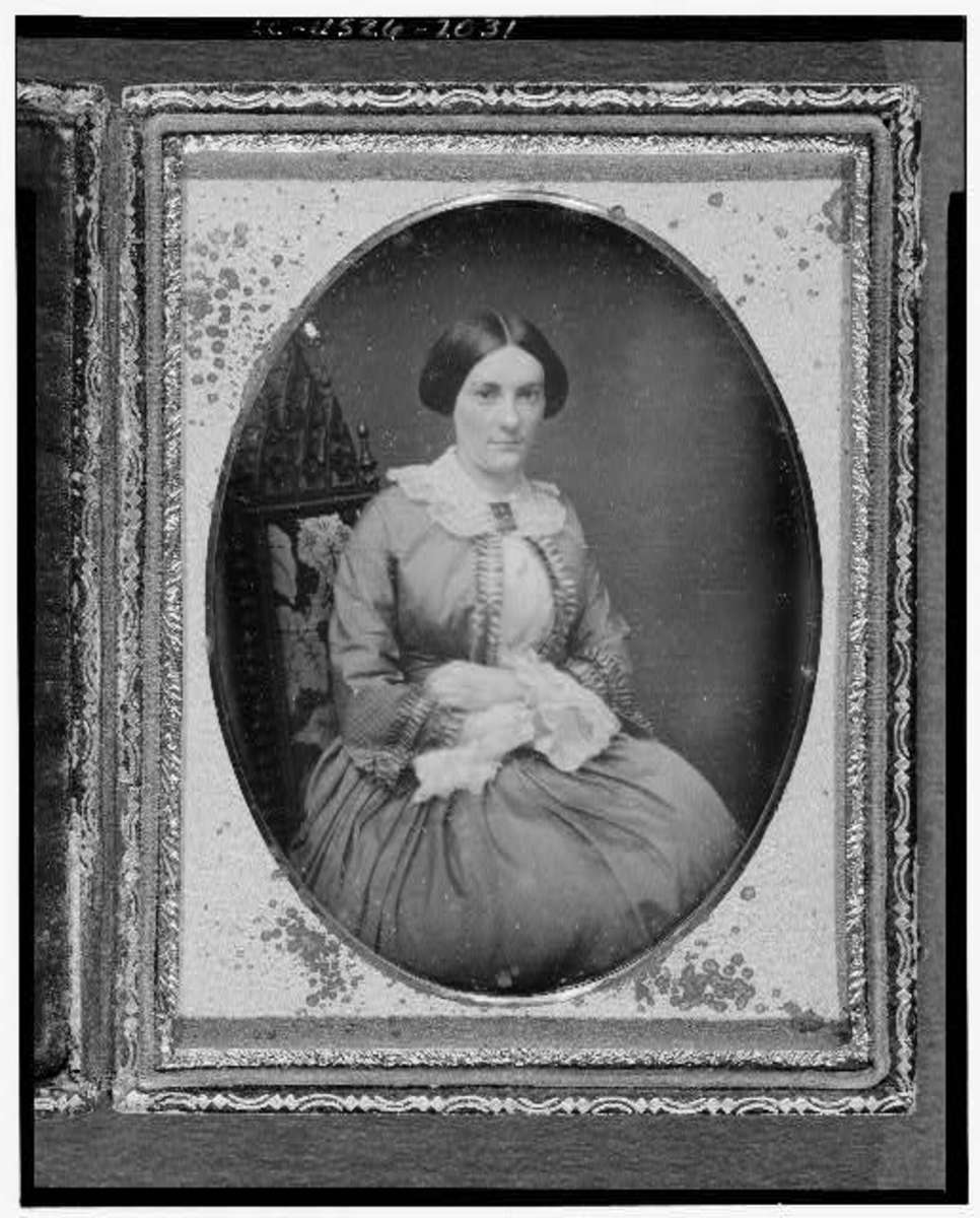 Civil War era woman wearing lace cuffs and collar