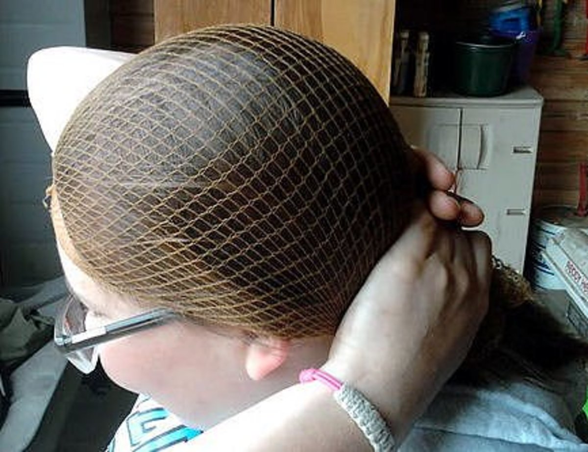 Step four: Secure your hair and hairnet into a low ponytail. 