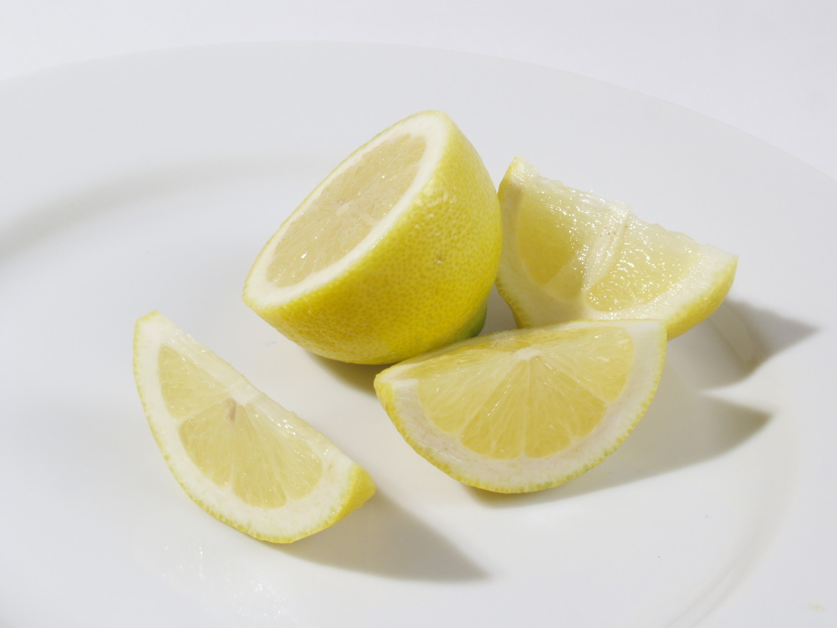 The acids in lemon and other citrus fruit help exfoliate and clear the skin. 