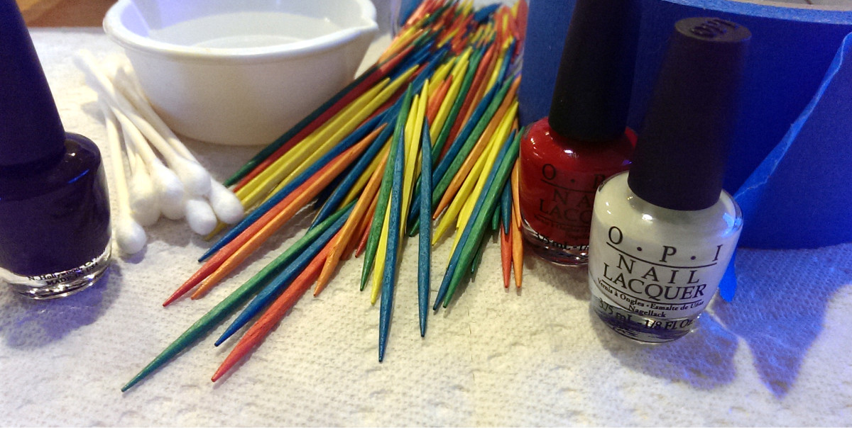 Supplies needed to create marbled nails at home.