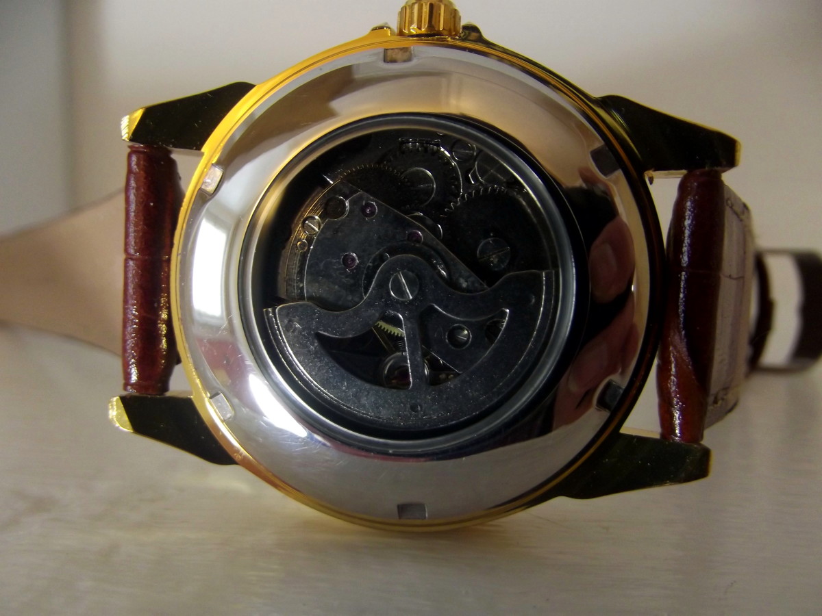 Automatic movement displayed through caseback of Sewor automatic wristwatch