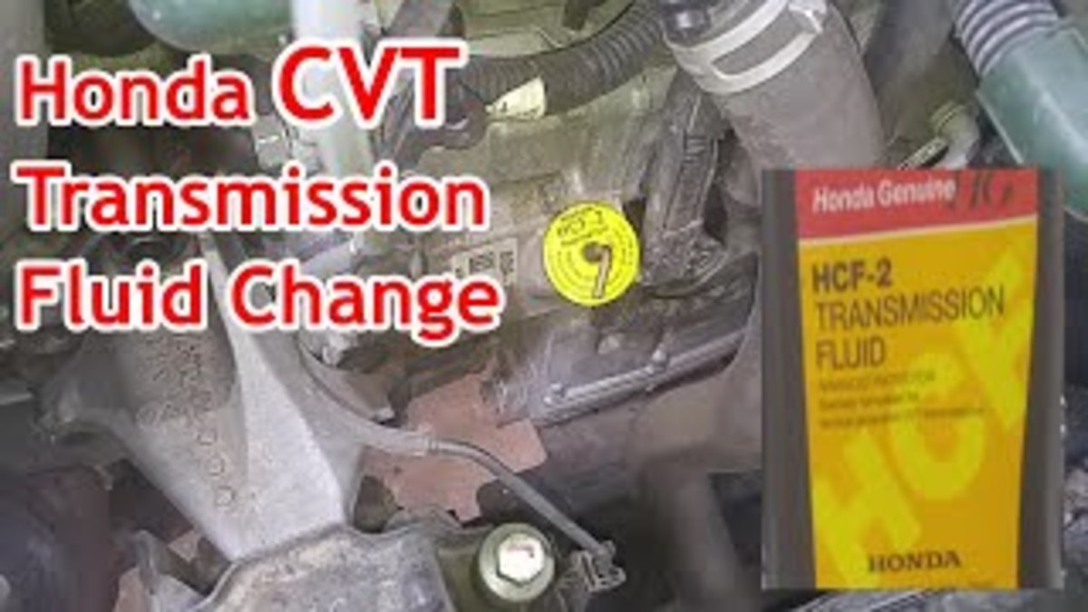 The yellow plug on the CVT transmission fluid fill port on the Honda Accord Sport GDI 2.4L.