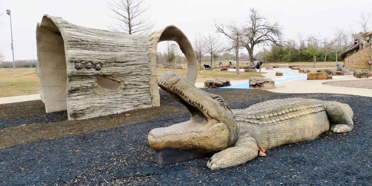 Large concrete alligator in Shady Lane Park