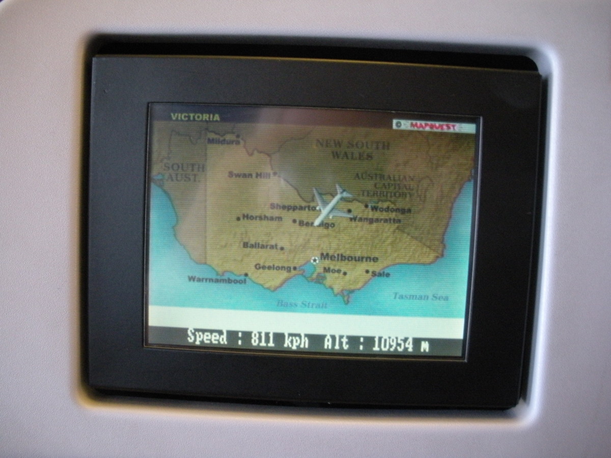 Some planes have screens in the backs of seats for inflight entertainment. They may show movies, or maps of the plane's progress. Some show a view of the ground during landing. You don't have to watch. :)