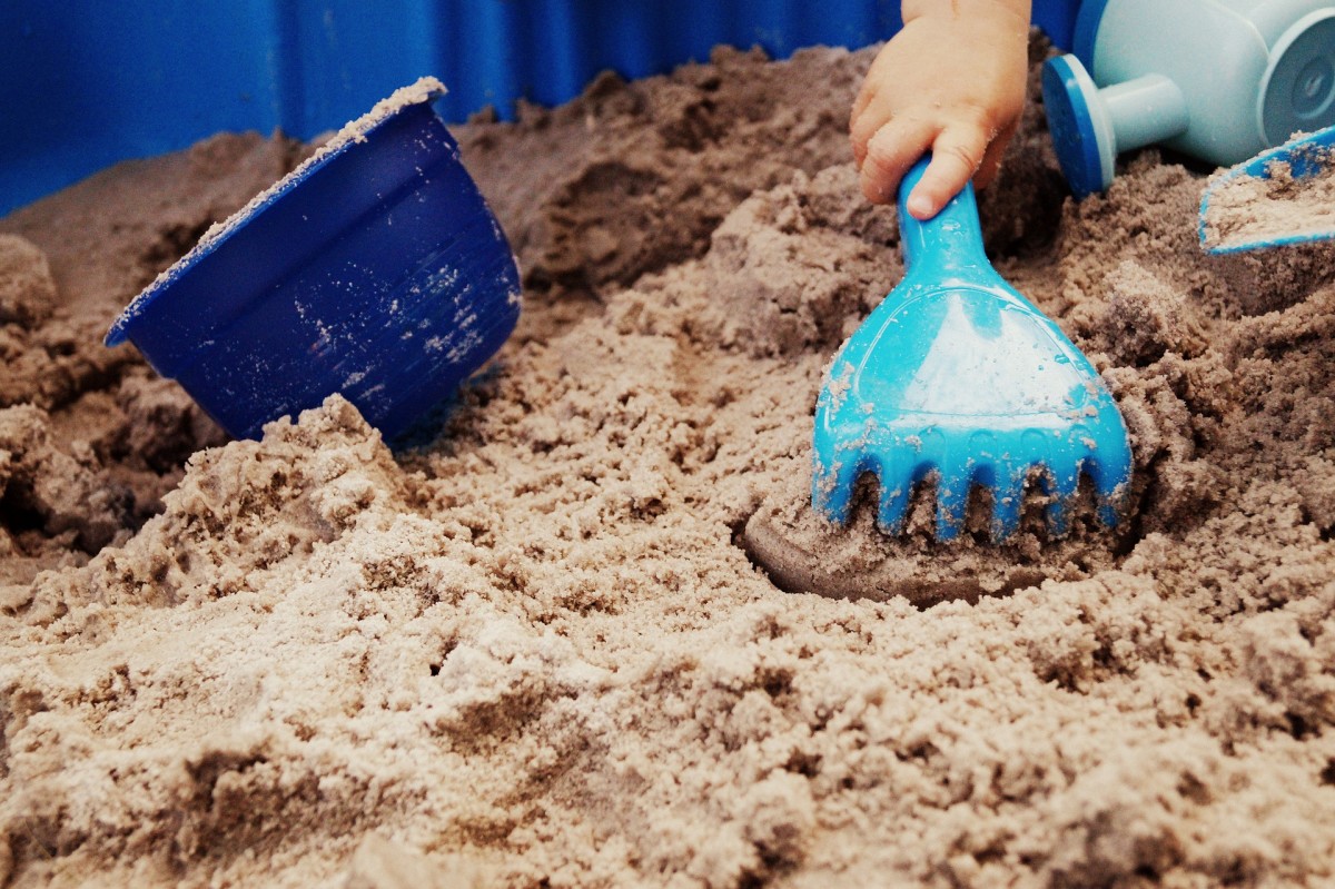 Playing in a sandbox.