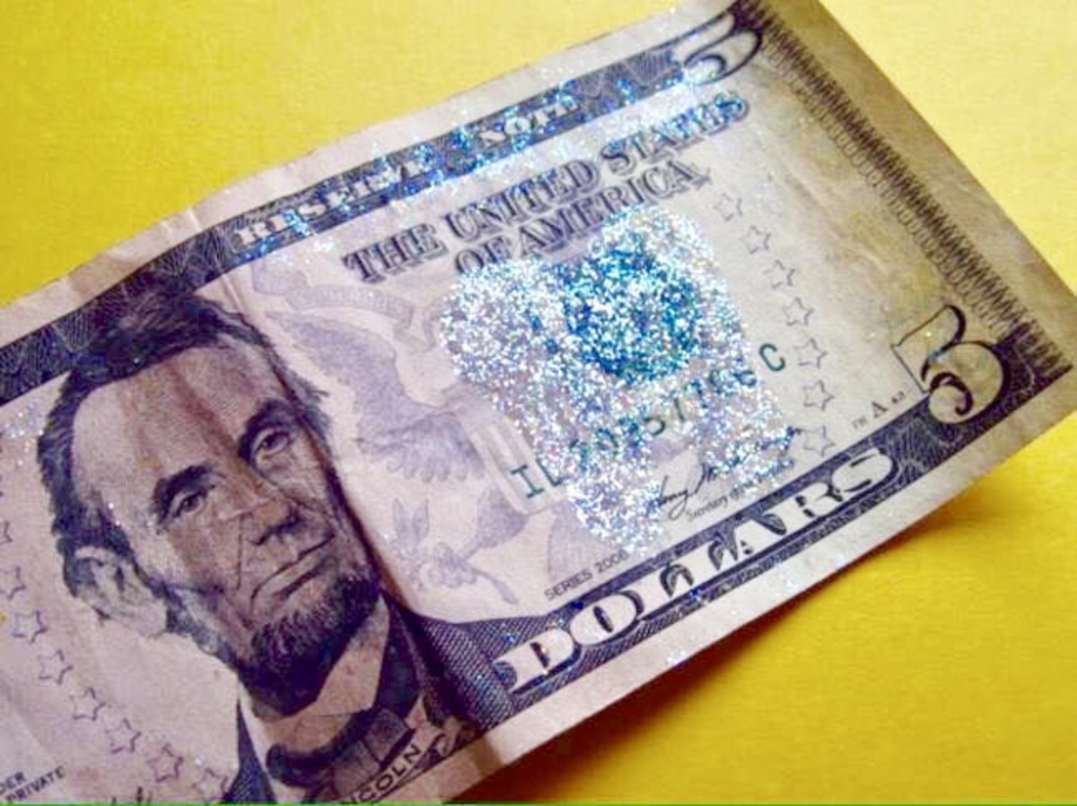 A five-dollar bill with Tooth Fairy glitter.