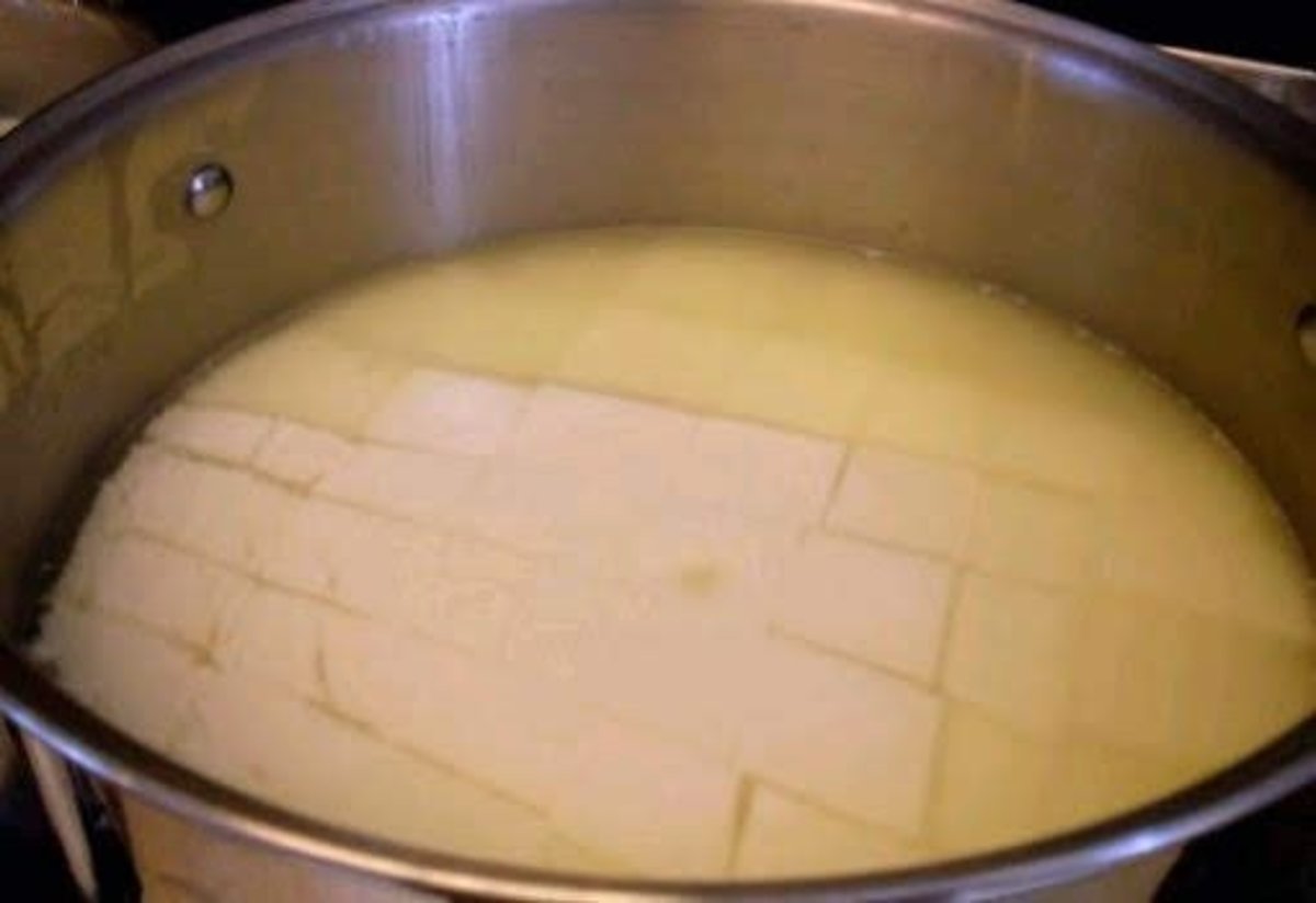 These curds have shrunk some, and begun to pull away from the edges of the pot, and each other.