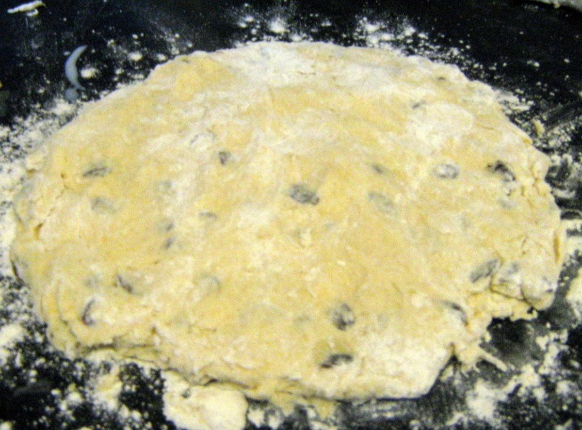 Roll out the scone mixture until it is 1 inch thick.