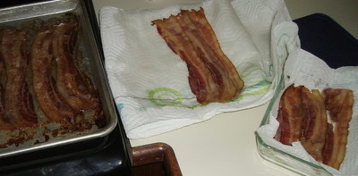 Use three or four sheets of paper towels to drain the bacon on. Use a couple more sheets and dab the top of the bacon to eliminate more grease.