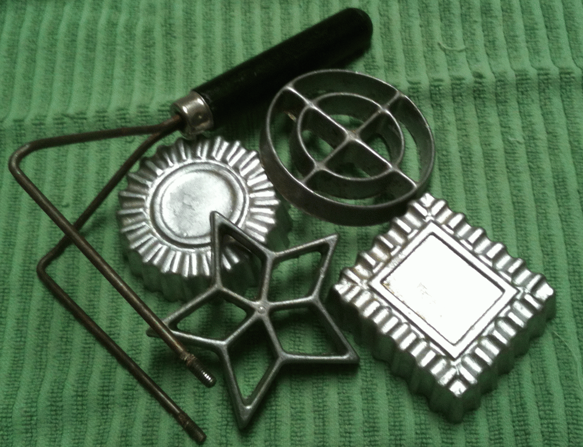 A rosette and timbale iron set 