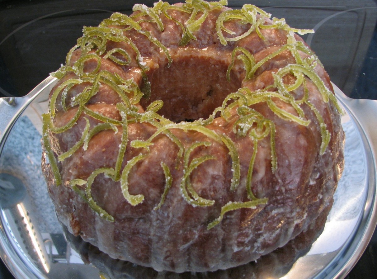 Lemon and lime cake with candied lime peel slivers.