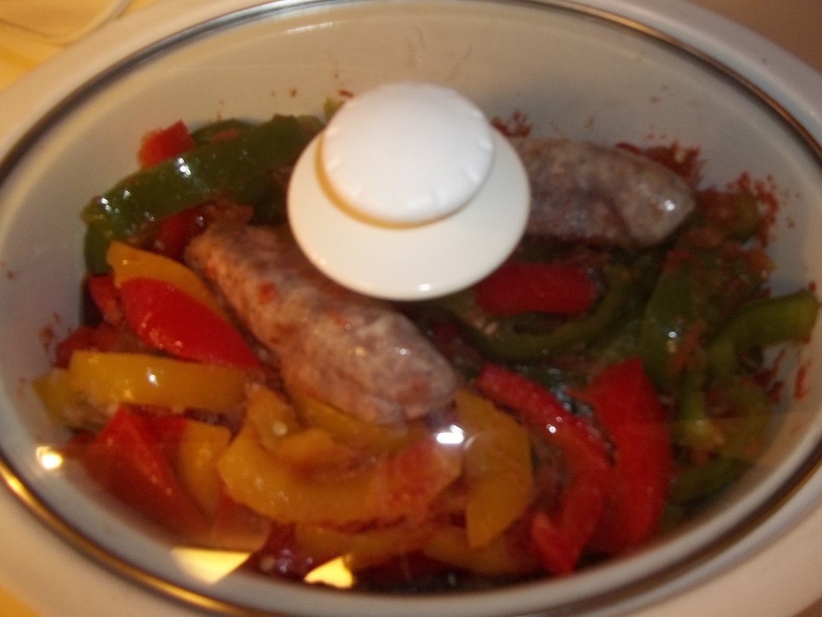 Slow cooker freezer meal of sausage and peppers, simmering away.