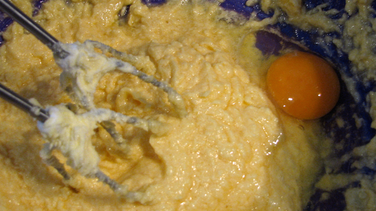 Add the eggs one at a time to the creamed butter and sugar, then add the vanilla.