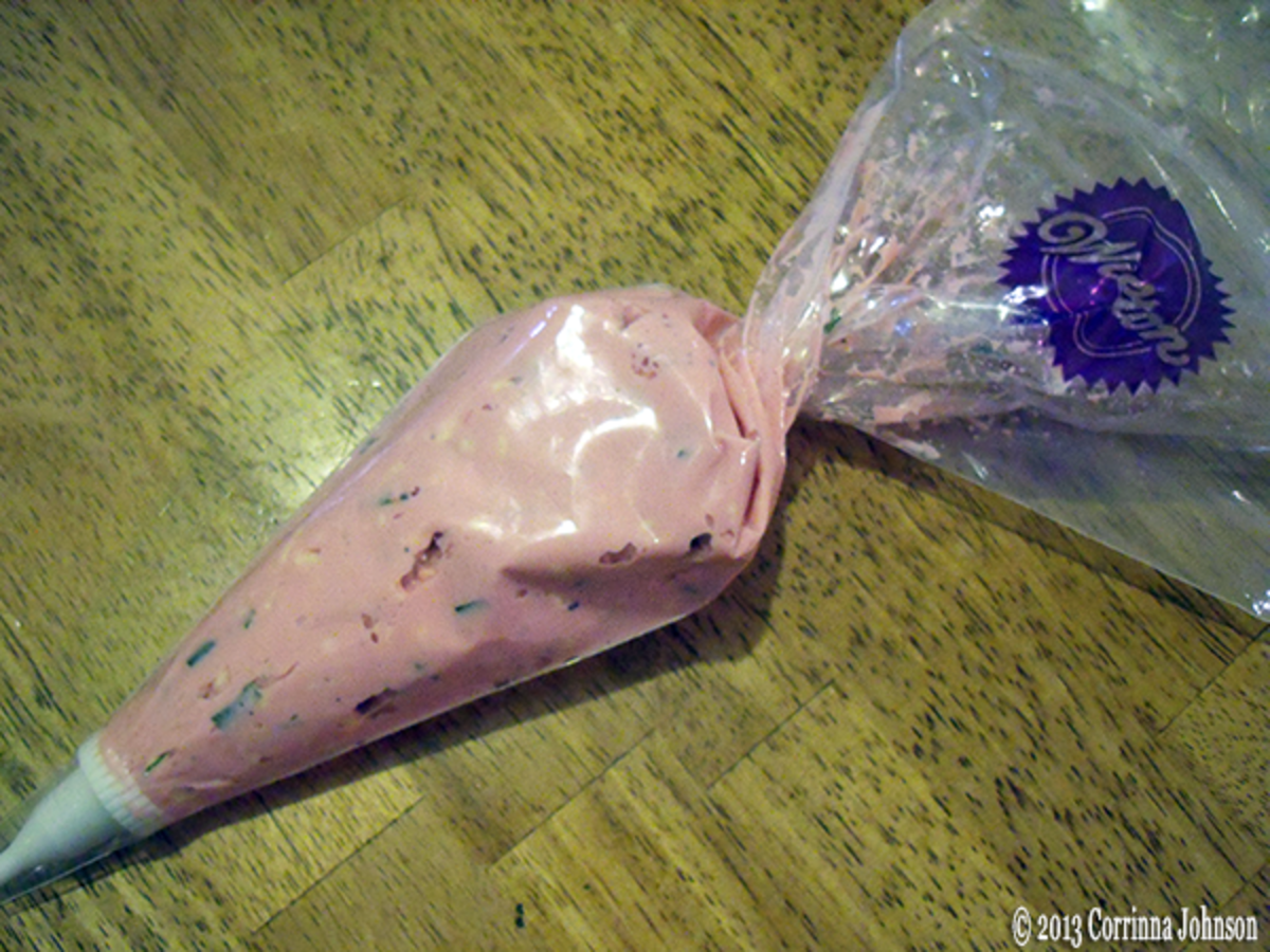 Step 6: Load a piping bag. Place the egg mixture into a disposable piping bag 