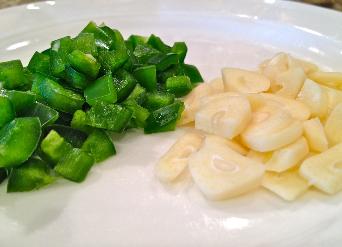 Chop garlic and jalapeño pepper.