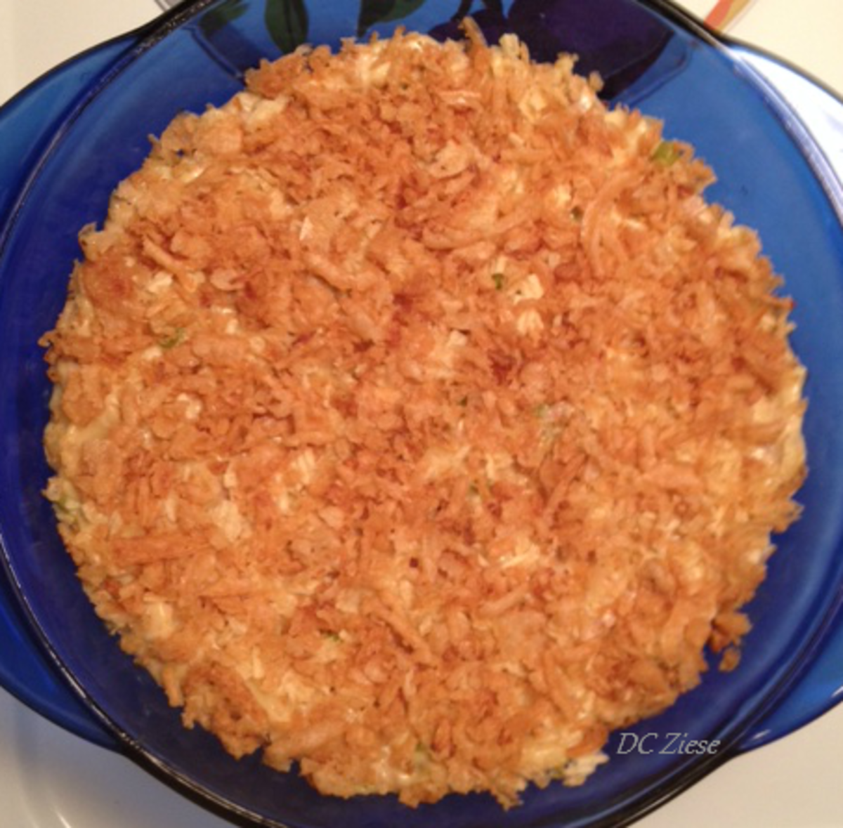 Shown: 1/2 recipe in a 2-quart casserole dish topped with 1/2 cup extra cheese, 1/2 cup "bottom-of-the-bag" lightly crushed potato chips and 1 cup French fried onions