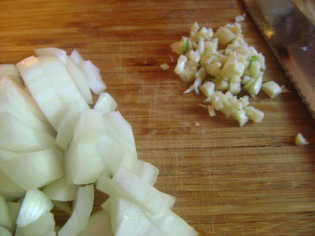 Step two: Chop 1 sweet onion, dice the garlic cloves