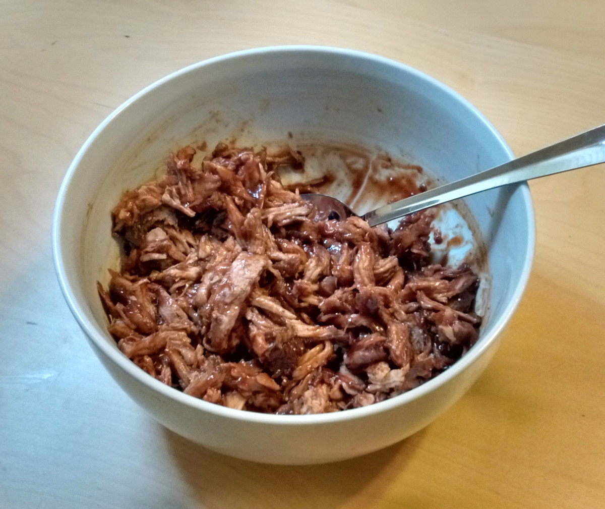 Shredded pork mixed with BBQ sauce