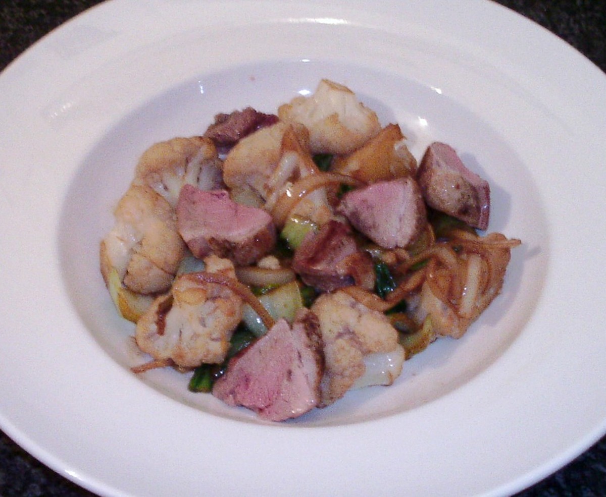 Cauliflower and pak choi are sauteed in duck roasting juices and served with the duck