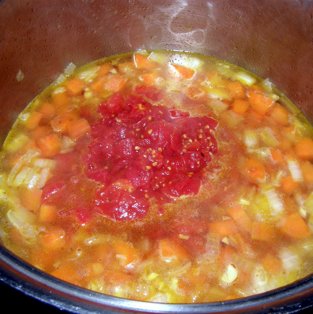 Add 1 can of diced tomatoes. 