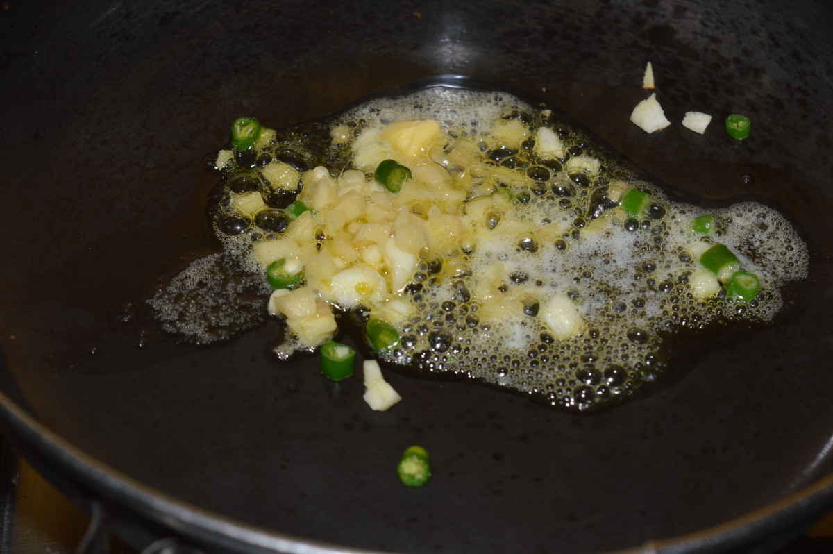 Step 1: Saute chopped ginger, garlic, and green chilies in butter.