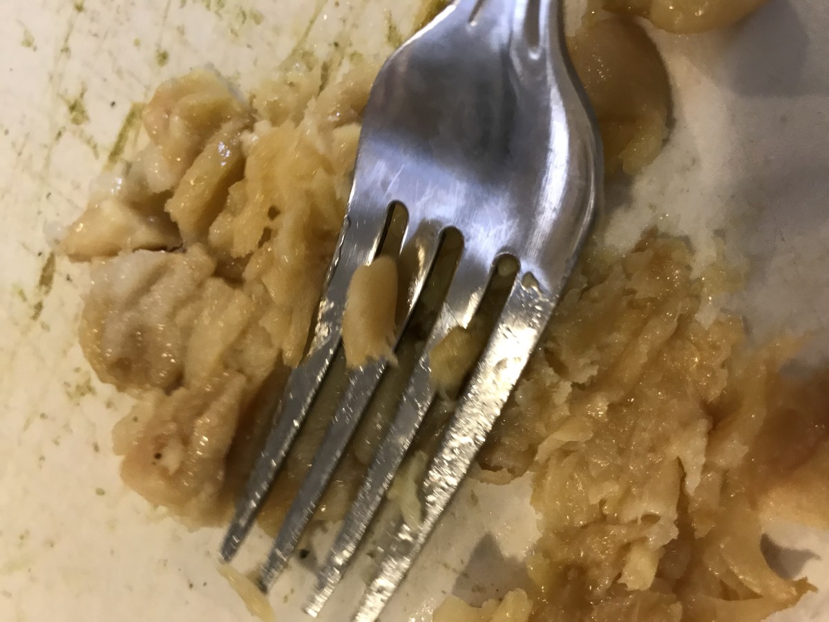 To ensure you get a nice, even distribution of the gorgeous nutty flavor of the roasted garlic, mash it into paste with the tines of a fork. You can use fresh if you'd like, just finely minced 3-4 cloves very finely.
