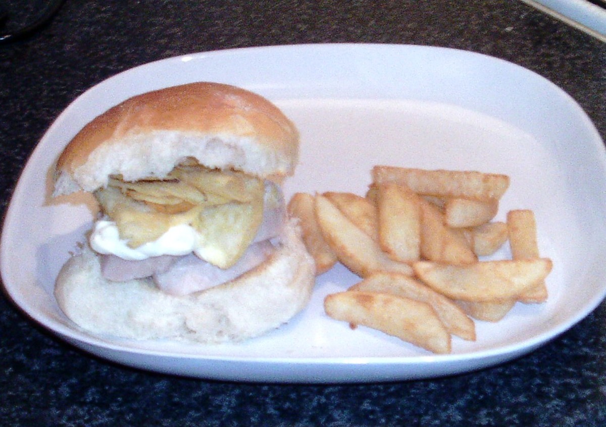 Pickled chicken breast, mayo and salt and vinegar crisps sandwich with homemade chips