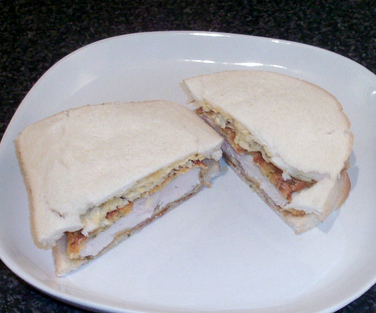 Homemade chicken and tarragon schnitzel with salt and vinegar crisps sandwich