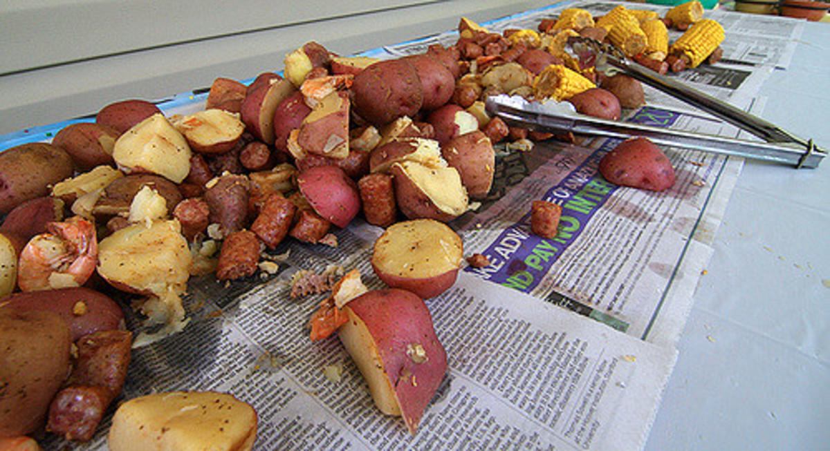 This is the easy way to serve a shrimp boil! Put newspaper on a table and dump it out!