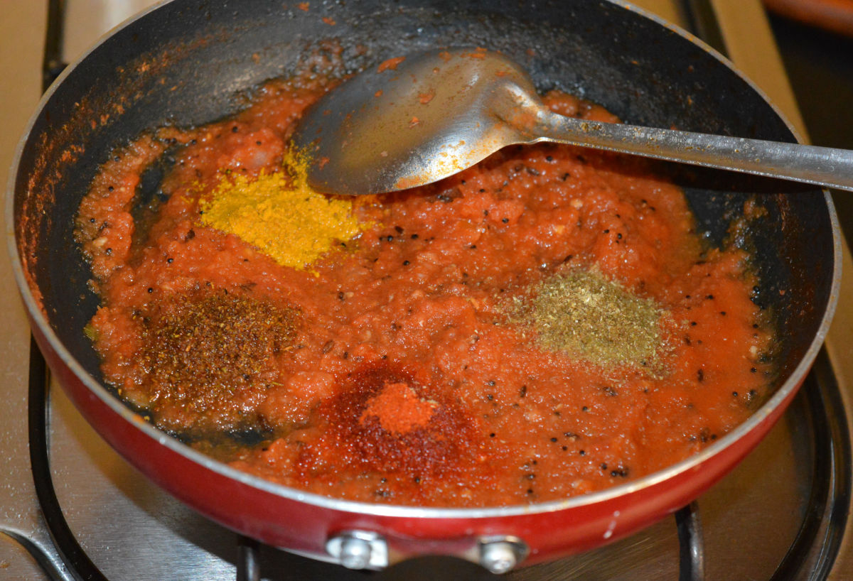 Step five: Add turmeric powder, garam masala powder, red chili powder, and coriander powder. Mix well. Saute for 2 more minutes.