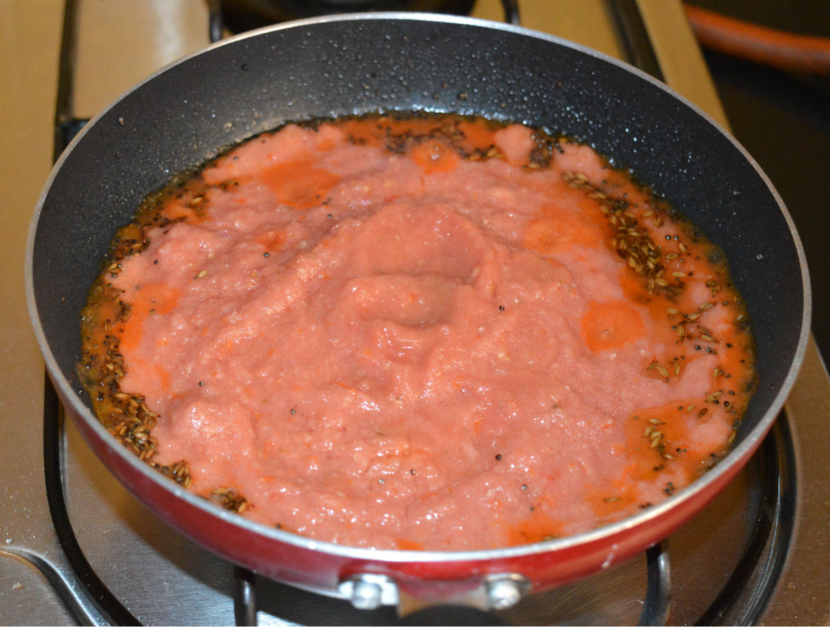 Step four: Add tomato paste. Saute over medium-high heat until the water evaporates.