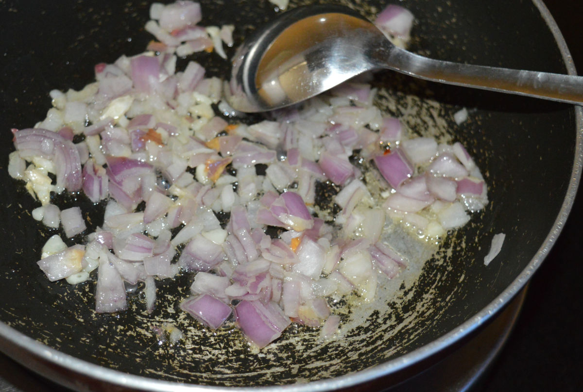 Step two: Heat oil in a deep-bottomed pan. Throw in chopped onions and minced garlic. Saute until onions are transparent.