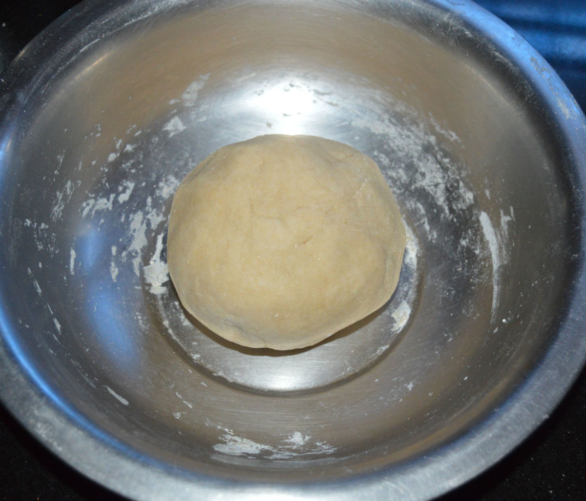 Step one: Make a firm, soft, and pliable dough as per instructions. Cover it and keep aside.
