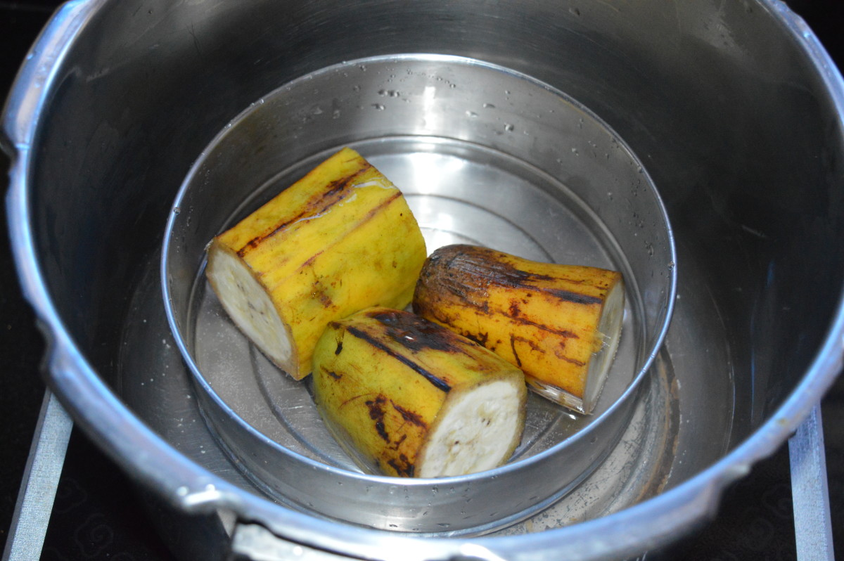 2. Cook raw bananas in a pressure cooker till they become soft.