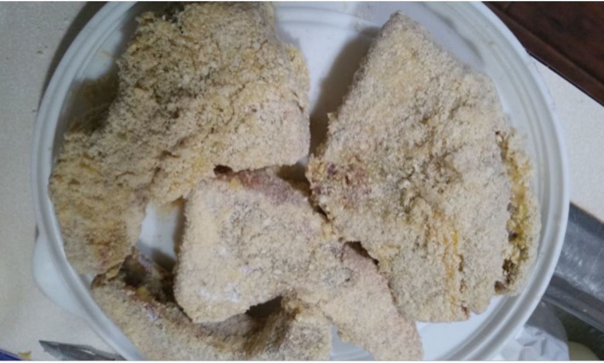 Breaded chops, ready for the fryer.