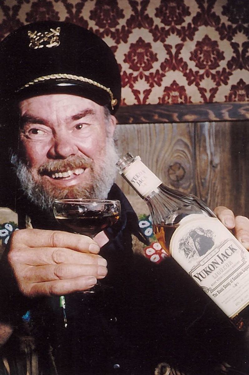 Capt. Dick Stevenson enjoys his favourite tipple. He willed his own toes to the saloon.