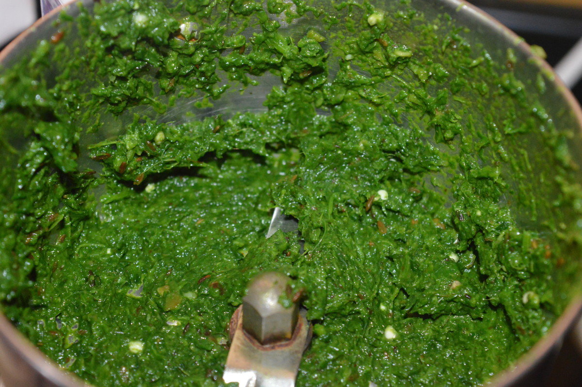 Transfer the greens mixture into a blender. Grind to get a coarse paste.