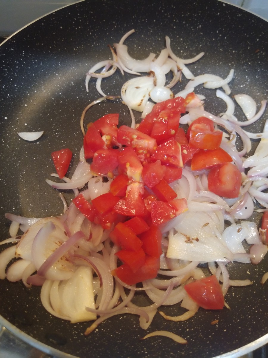Add chopped tomatoes.