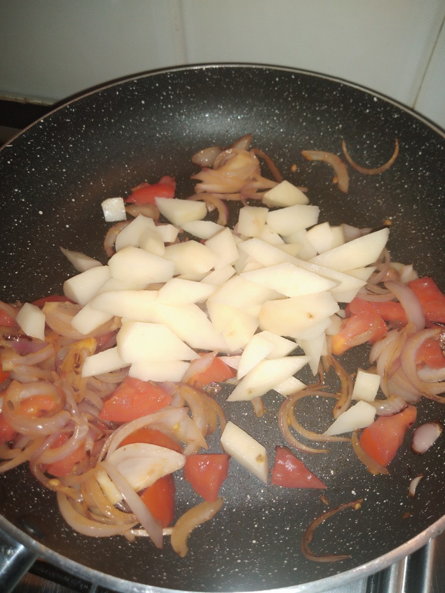 Add chopped potatoes.