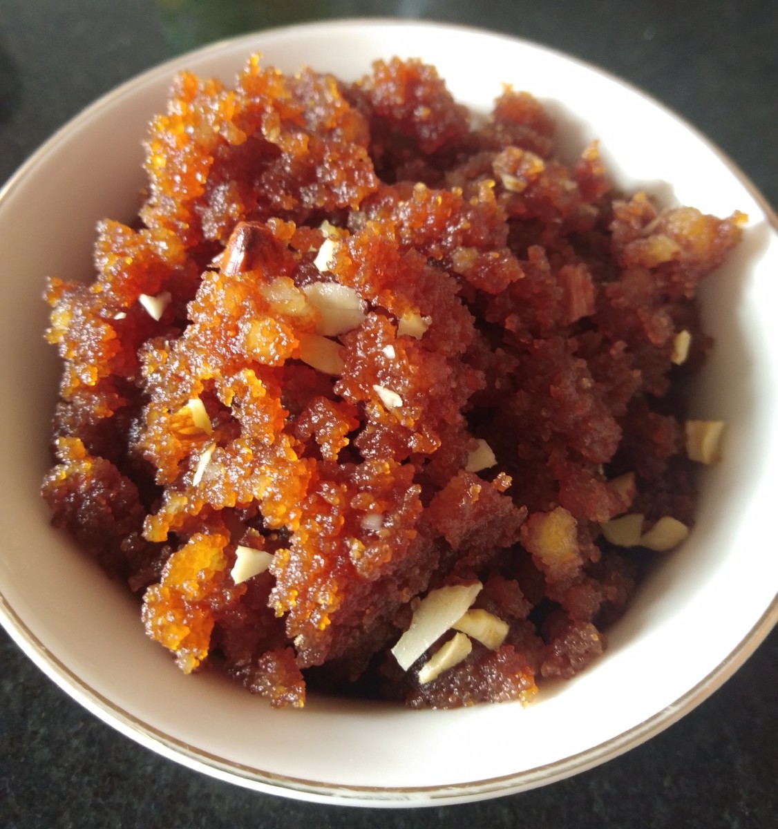 Delicious suji halwa is ready to taste. Serve hot, warm, or at room temperature.