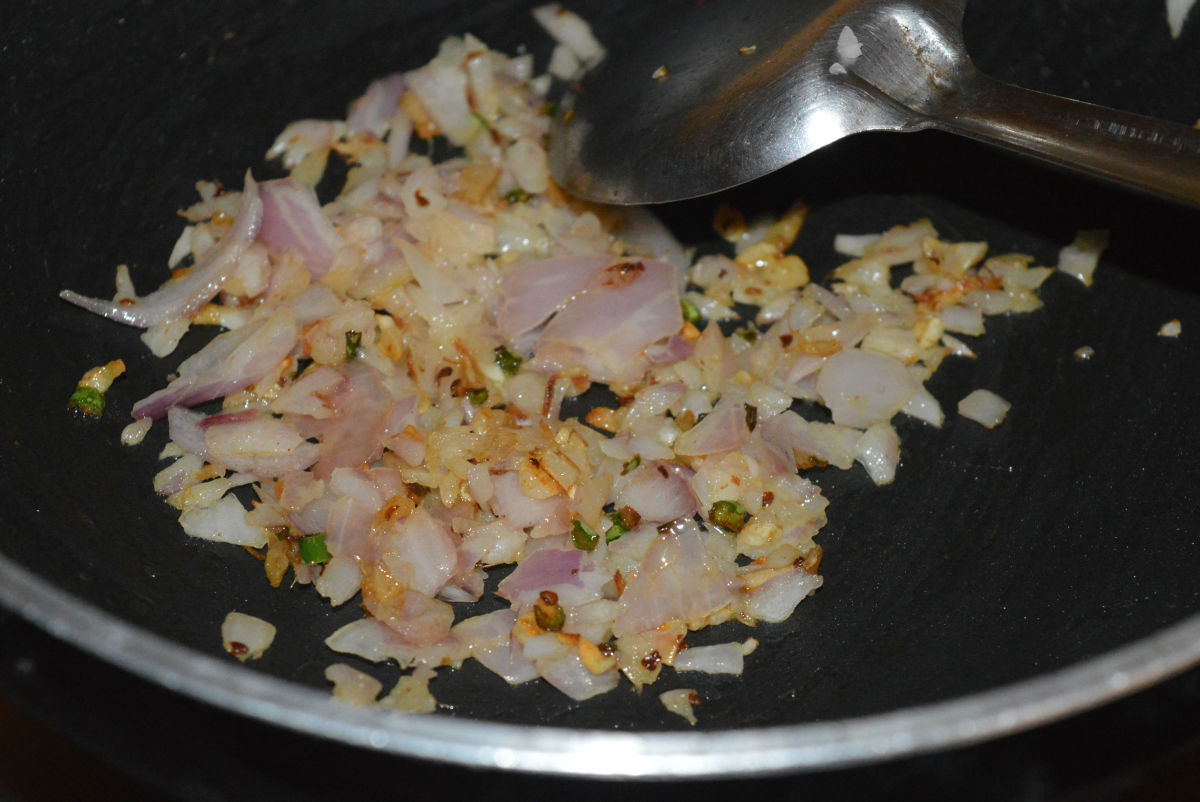 Add chopped onions. Saute the mixture until the onions become pinkish.